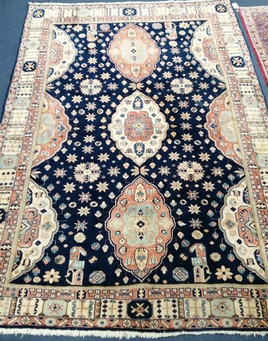A Caucasian blue ground rug 220 x 149cm